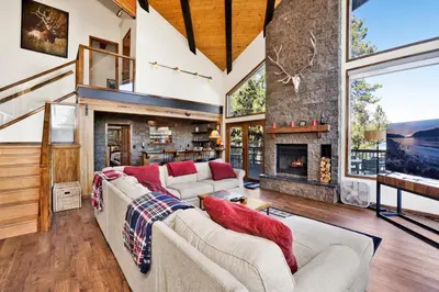 a living room with two couches and a fireplace at The Birdhouse at Big Bear Lake- Lakeview Family Retreat in Big Bear Lake