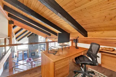 an office with a desk with a computer and a chair at The Birdhouse at Big Bear Lake- Lakeview Family Retreat in Big Bear Lake