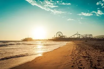 a beach with an amusement park and a roller coaster at Beautiful 2bd 2bth apartment in Santa Monica in Los Angeles