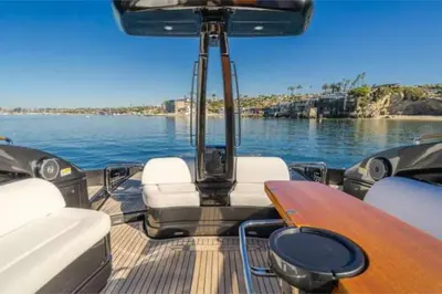 a boat with chairs and a table on the water at Riva Virtus 65 Yacht Trip w Captain Overnight Stay 2812 in Los Angeles