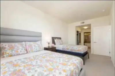 a bedroom with two beds in a room at Stunning 2BR Penthouse Patio & View Venice MDR in Los Angeles