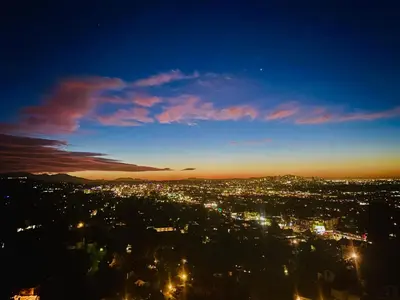 a view of a city at night at Hollywood hill stunning view cozy private room in Los Angeles