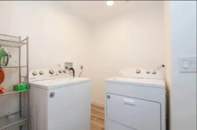 a kitchen with a stove and a dishwasher at Charming 2BR Condo with Onsite Parking Included in Los Angeles