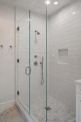 a shower with a glass door in a bathroom at Studio City Stunning House with 5 bedrooms, Pool, Jacuzzi, Fire-pit, Guest House in Studio City