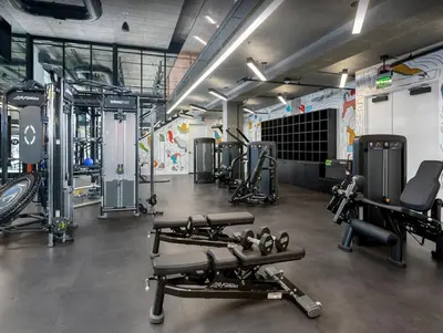 a gym with several treadmills and machines in it at Modern Stay in Arts District LA in Los Angeles
