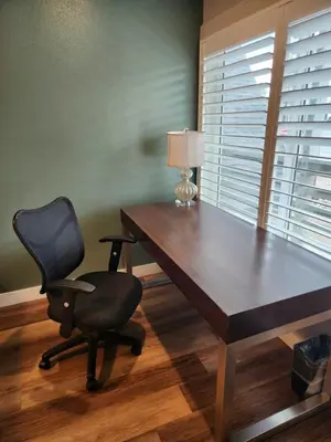 a desk with a chair and a lamp in a room at Studio 9 Big Bear Lake in Big Bear Lake