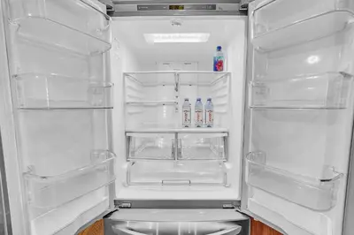 a refrigerator with its door open with drinks in it at Luxe Townhome Newly-Built in Sherman Oaks Community Hospital Heliport