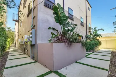 a plant in a pot on the side of a building at Luxe Townhome Newly-Built in Sherman Oaks Community Hospital Heliport