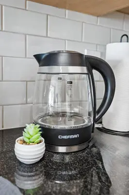 a tea kettle on a kitchen counter with a plant at Marina del Rey getaway,Free parking,Pool,Hot Tub in Los Angeles