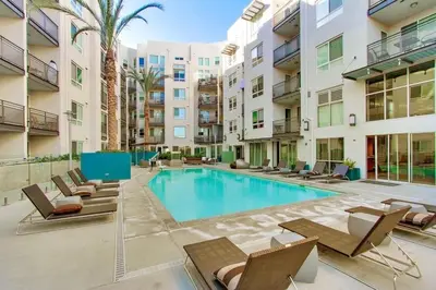 a swimming pool with chaise lounge chairs and a hotel at Marina del Rey getaway,Free parking,Pool,Hot Tub in Los Angeles