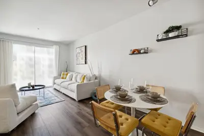 a living room with a table and chairs at 2BDR Home Away From Home in Marina del Rey in Los Angeles