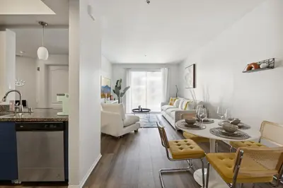a kitchen and living room with a table and chairs at 2BDR Home Away From Home in Marina del Rey in Los Angeles