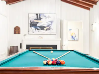 a pool table with cue balls on top of it at Charming 4 Bedrooms Family House - WIL-WW in Los Angeles