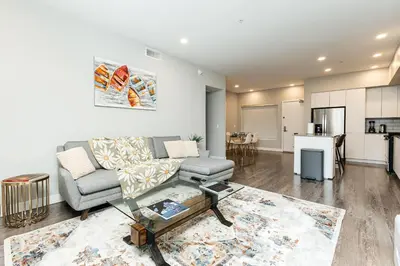 a living room with a couch and a table at Magnificent two bedroom in West Hollywood in Los Angeles