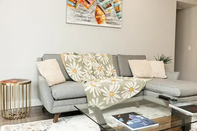 a living room with a couch and a table at Magnificent two bedroom in West Hollywood in Los Angeles