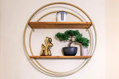 a round mirror hanging on a wall with plants at Marina del Rey 1bdr Retreat with pool, gym, free parking in Los Angeles