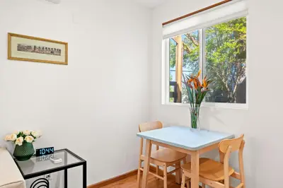 a dining room with a table and a window at Scenic Retreat with Deck & Stunning Views in LA in Glendale