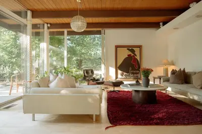 a living room with a white couch and a red rug at Villa Mountain Getaway with a Pool Hot Tub 5 Beds in Los Angeles