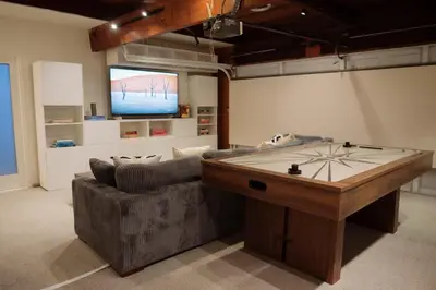 a living room with a pool table and a tv at Villa Mountain Getaway with a Pool Hot Tub 5 Beds in Los Angeles