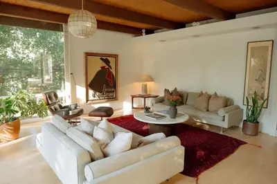 a living room with a white couch and a table at Villa Mountain Getaway with a Pool Hot Tub 5 Beds in Los Angeles