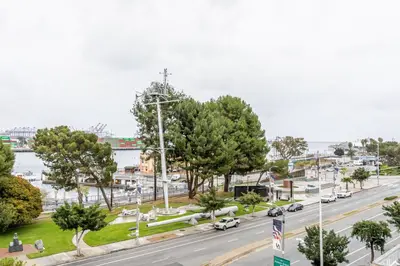an aerial view of a street with cars on the road at Blueground San Pedro AC balcony nr USS Iowa LAX-1301 in Los Angeles