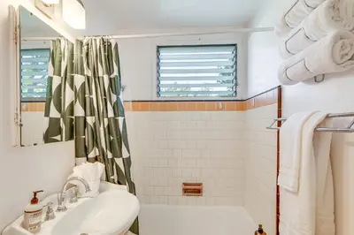 a bathroom with a sink and a shower at 2 Mi to Griffith Park Chic Home with Private Patio in Burbank