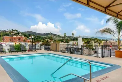 a swimming pool with a view of a city at 2BR Hollywood Apt Deluxe in Los Angeles