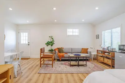 a living room with a couch and a table at Cute Guest Studio near Universal Studios sleeps 4 in Los Angeles