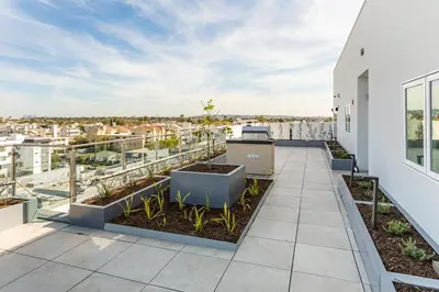 a balcony with a view of a city at 3 Bedroom 2 Bath Westwood Condo in Los Angeles