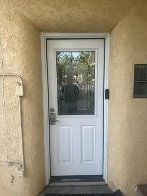 a white door with a window on a building at Happy Room Near Citrus College in Glendora