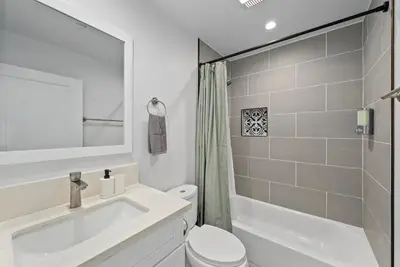 a white bathroom with a sink and a toilet at South Bay 3 bed Escape! in Harbor City