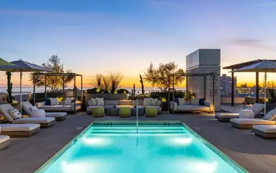 a pool on the roof of a building at Luxurious 2-Bedroom Retreat in Santa Monica in Los Angeles