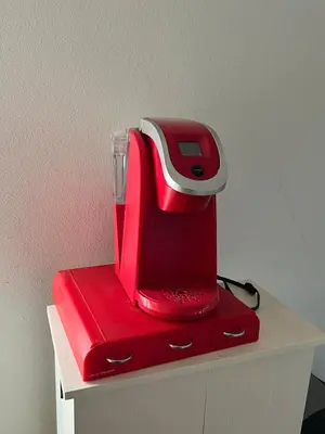 a red blender sitting on top of a shelf at B and G Studio Space Guesthouse in San Bernardino