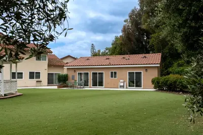 a house with a green lawn in front of it at Newly built vacation home with large backyard in Diamond Bar