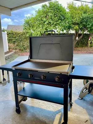 a grill sitting on top of a table at Unique & Spacious house near Disney, Knott, BBQ in Buena Park