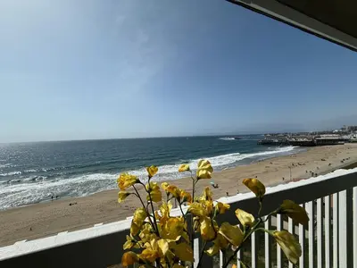 a view of the beach from the balcony of a condo at Oceanfront 1 Bed 1 Bath , Parking, Stunning View 337 in Redondo Beach