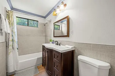 a bathroom with a sink and a toilet and a tub at Spacious Retreat w Large Kitchen & Outdoor Patio in Pasadena