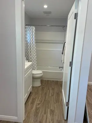 a bathroom with a toilet and a shower at Modern 1-bedroom Studio with Kitchen and Laundry in Santa Clarita