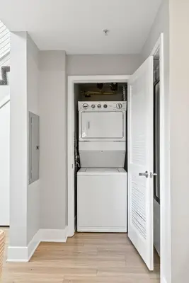 a white kitchen with an oven in a room at Spacious Loft- Hollywood Free Pool, Parking, Gym in Los Angeles