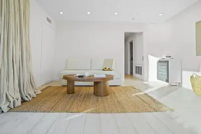a living room with a coffee table and a couch at The Surf Lodge Villa in Malibu