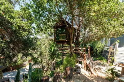 a tree house in the middle of a garden at Tranquil and Secluded Retreat in Topanga Canyon in Topanga