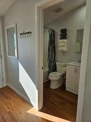 a bathroom with a toilet and a sink at Modern 1-bedroom Studio with Full Kitchen and Bath in Santa Clarita