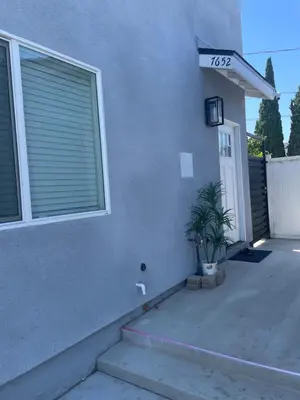 a house with a sign on the side of it at Vacation home in Westminster