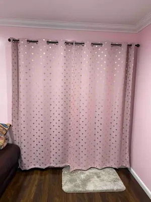 a living room with a pink and white polka dot curtains at Pool Front Romantic Getaway withPrivate Entry in North Hills