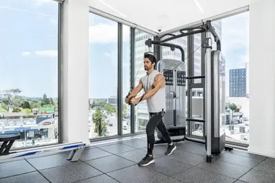 a man running on a treadmill in a building at The Sky Gem in Los Angeles