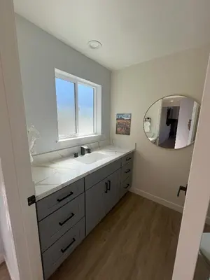 a bathroom with a sink and a mirror at Rancho del Cielo in Twin Lakes