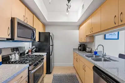 a kitchen with a stove and a sink at 12 Best Location Cozy Apartment in Los Angeles