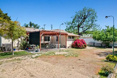 a house that is being built in a yard at Modern 4bed 3bath home with piano near Universal Studio & Hollywood for 10 in Studio City