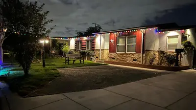 a house with christmas lights on it at night at Cozy Beautiful Private Home in Prime Location in Glendora