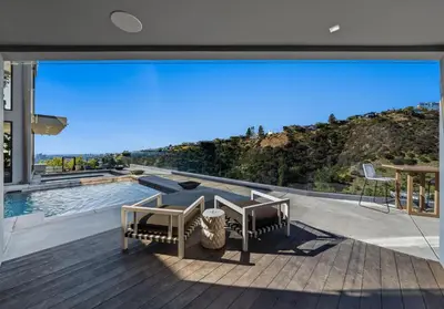 a house with a view of the ocean at Ocean to City Views, Fire Feature, Water falls Dream Oasis in Los Angeles